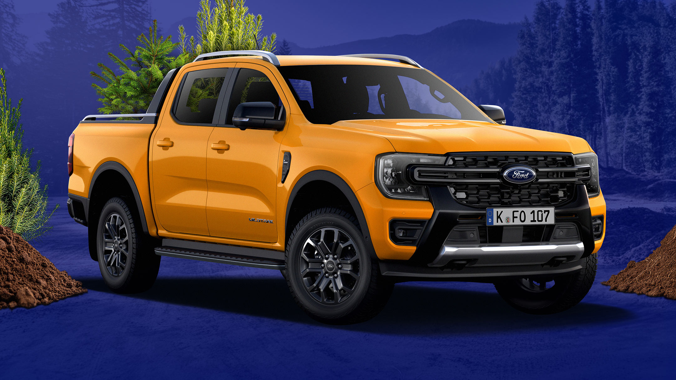 Ford Ranger jaune avec des arbres sur fond bleu