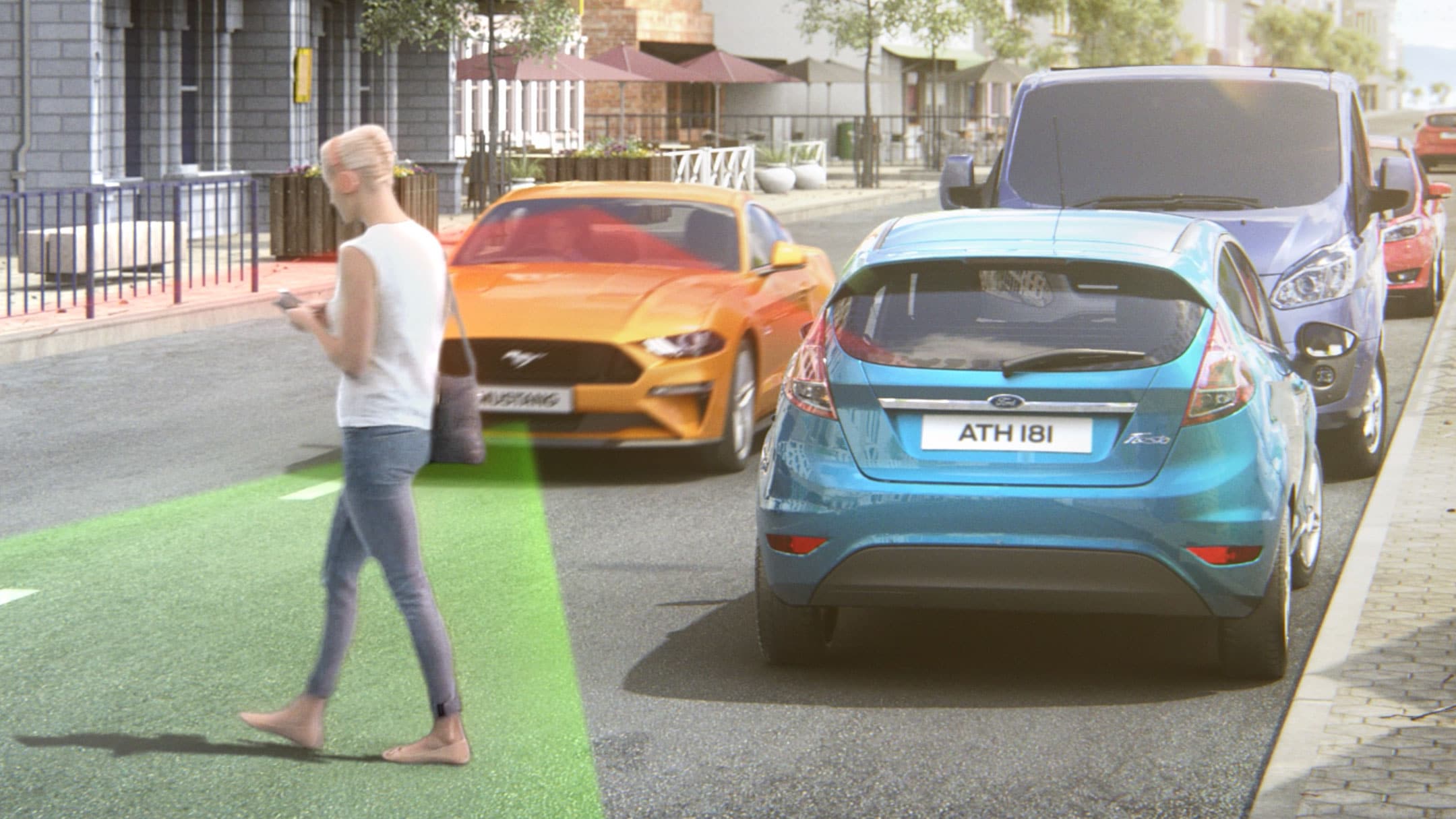 Ford Mustang couleur orange. Vue avant, roulant sur une route avec circulation en sens inverse et visualisation de l’assistant pré-collision qui détecte un piéton