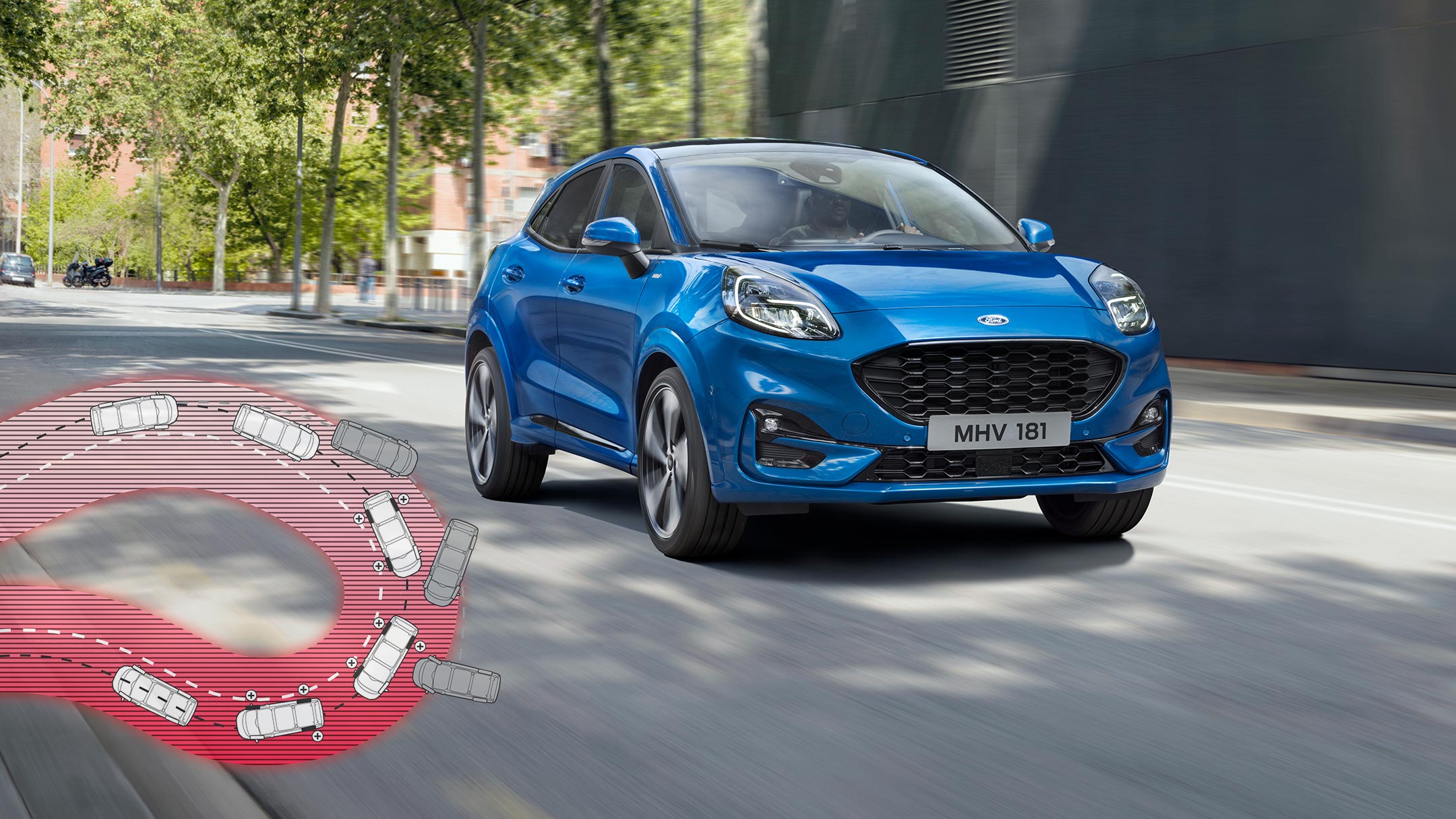 Le Ford Puma en bleu sur la route. Dans le coin inférieur gauche une représentation schématique d'un virage en épingle