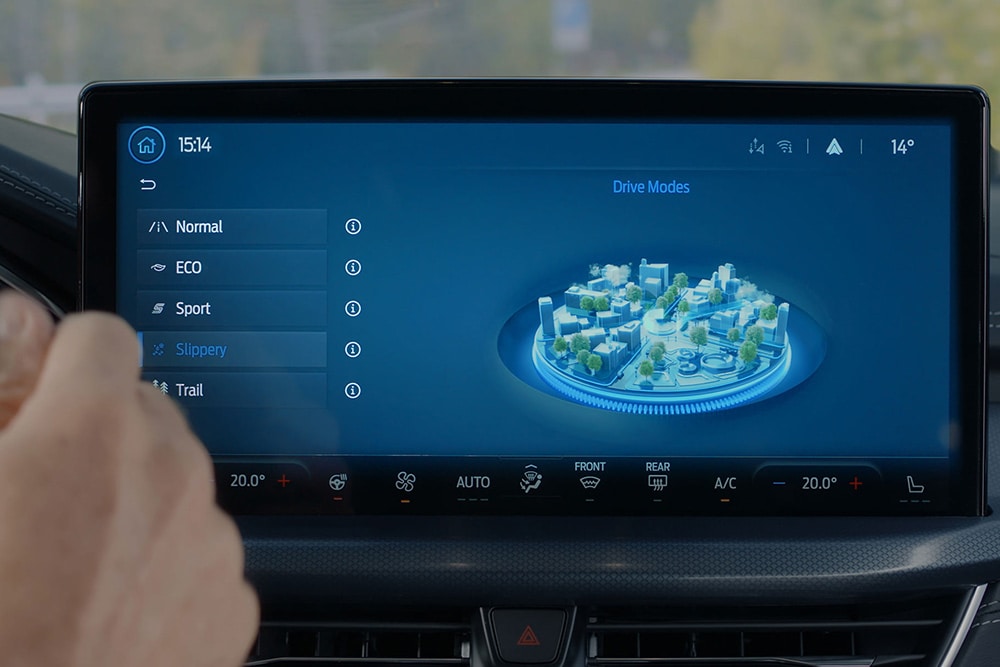 Vue détaillée du système d’infodivertissement SYNC® 4 de la Ford Focus, avec mise en évidence des modes de conduite sélectionnables.