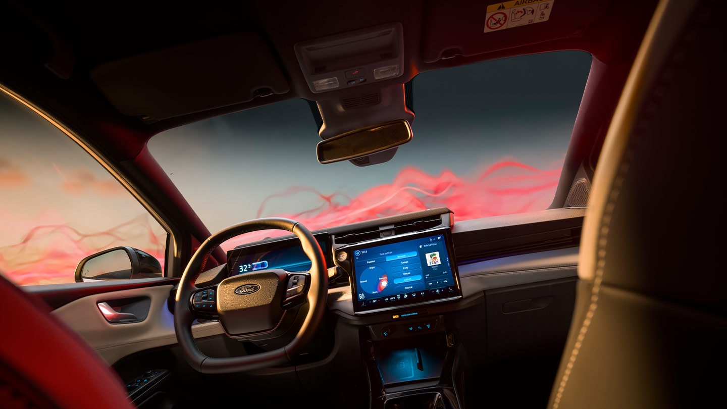 Habitacle du Ford Puma Sound Edition avec volant et écran tactile.