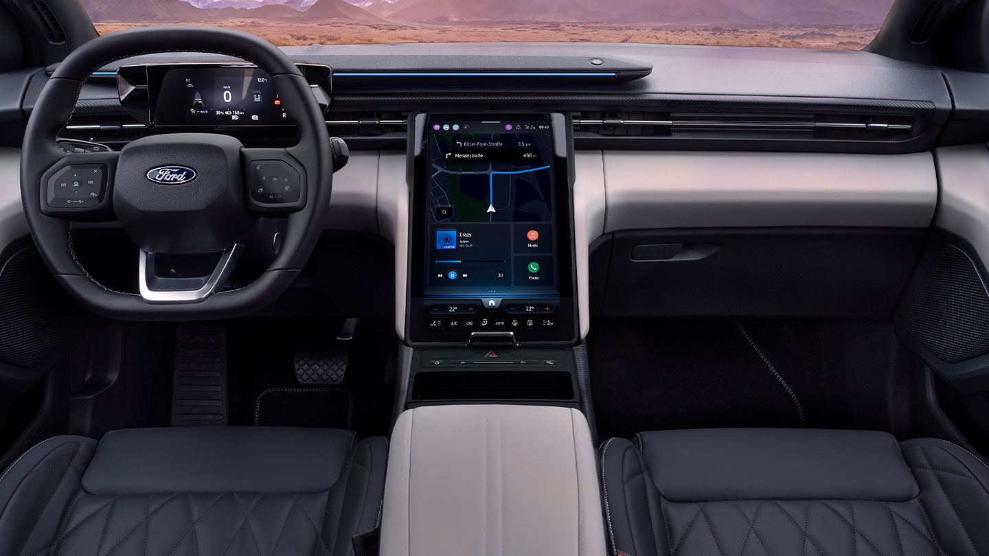Gros plan sur le tableau de bord du Ford Explorer, avec son volant et son grand écran tactile de 14.6 pouces SYNC® Move. 
