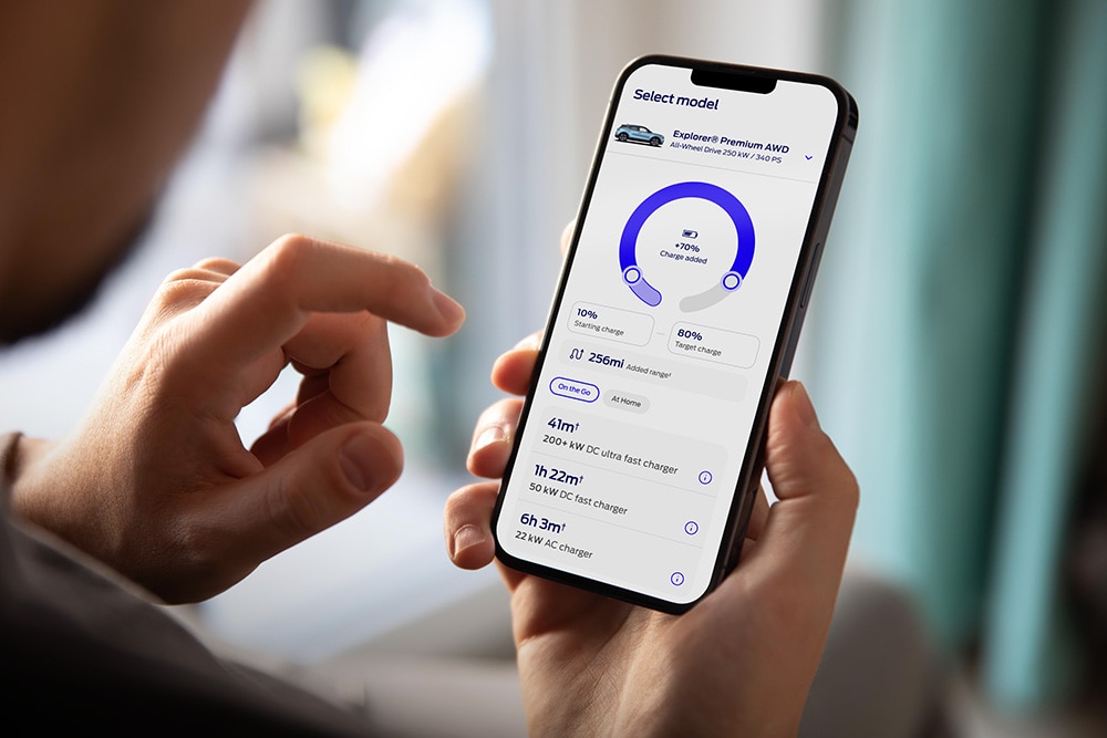 Person using the Ford EV Life website tool on their mobile phone.