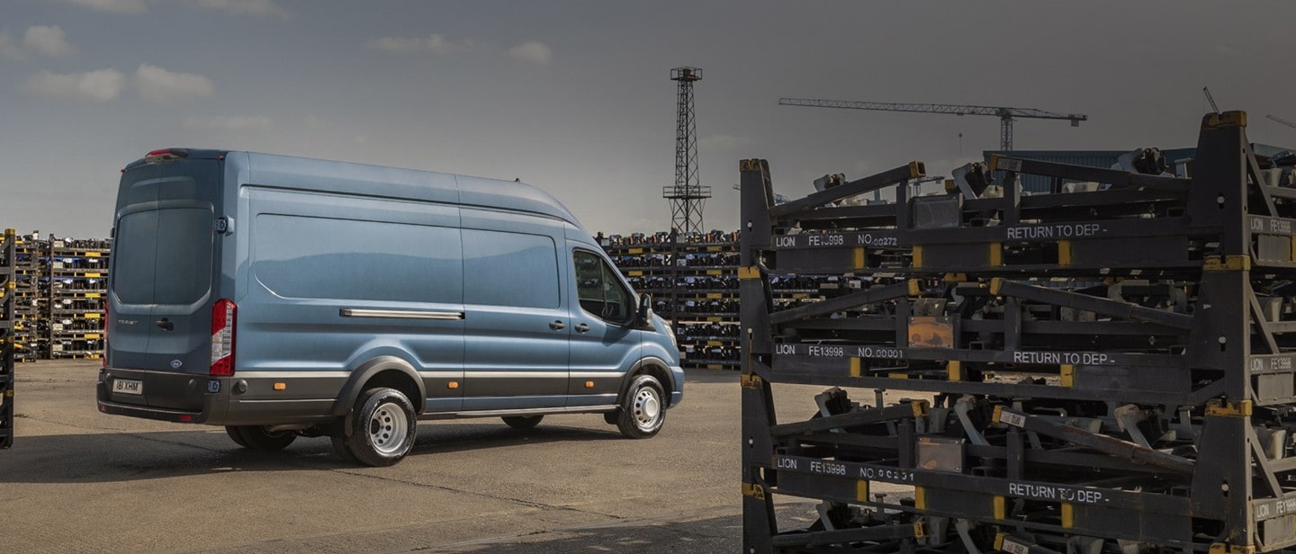 New Blue Ford Transit Van rear view on dock