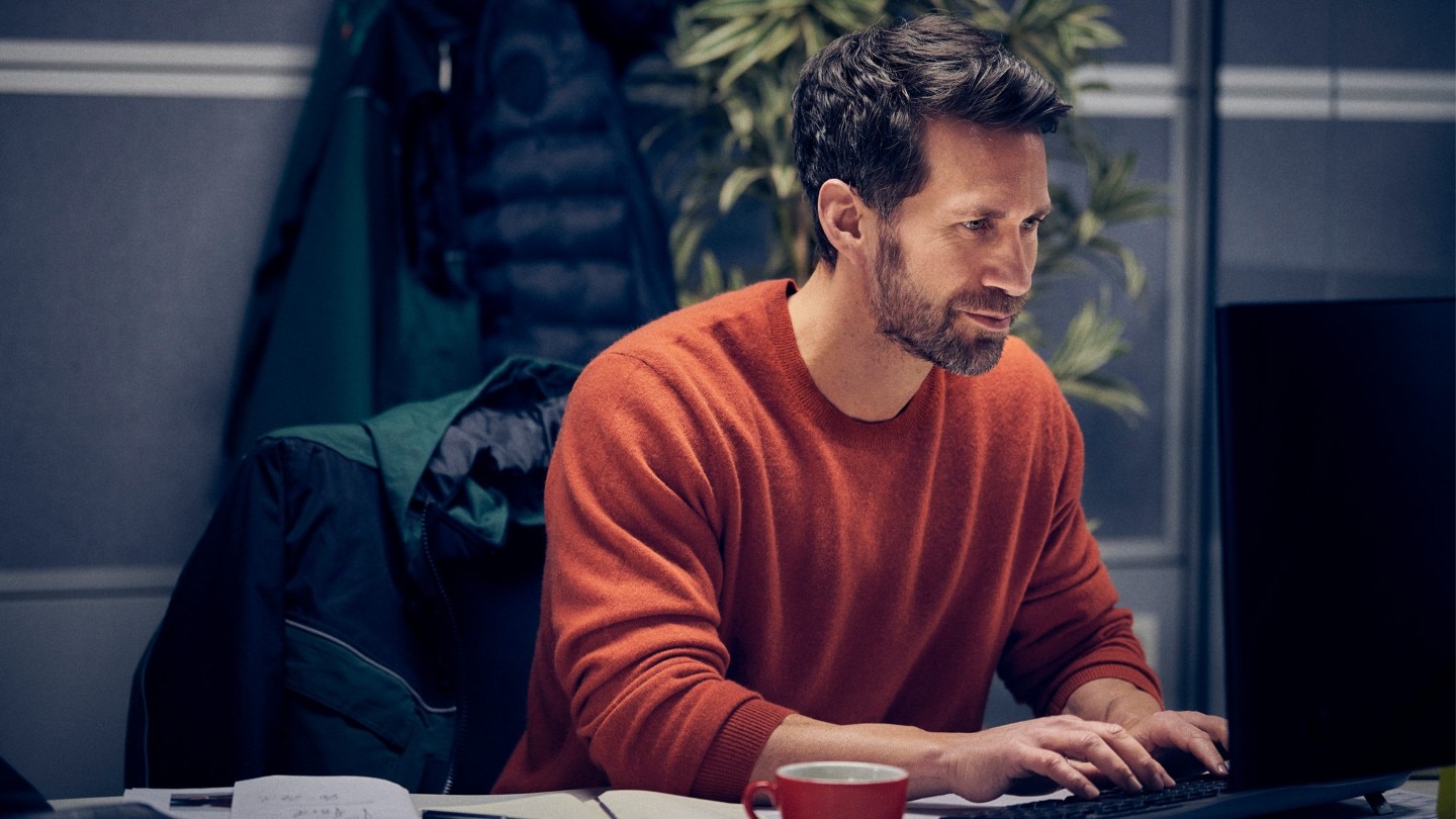 Man booking a van service on a computer